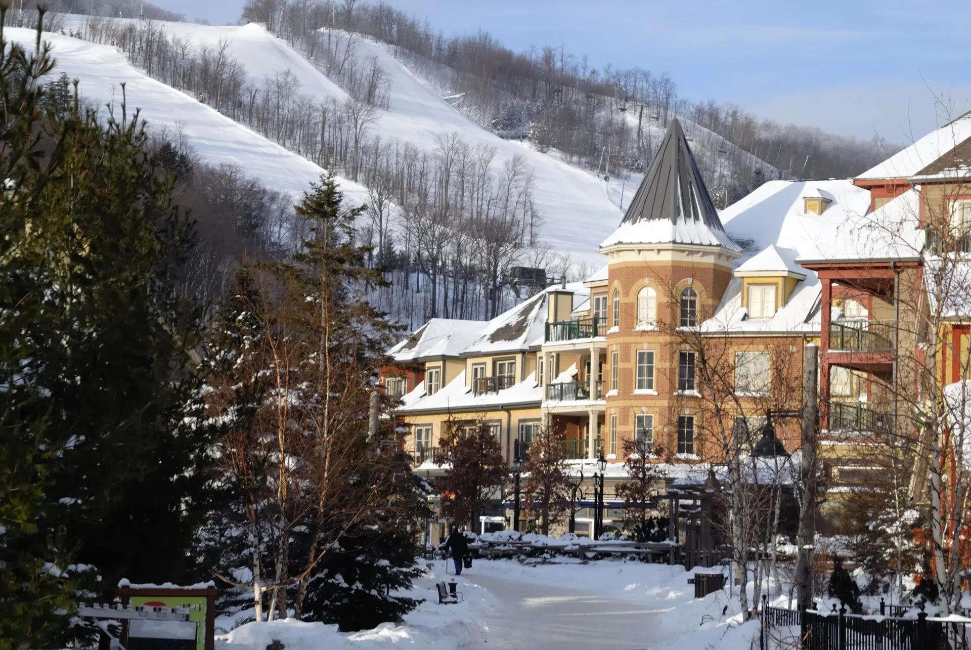 Blue Mountain Village in winter with ski slopes